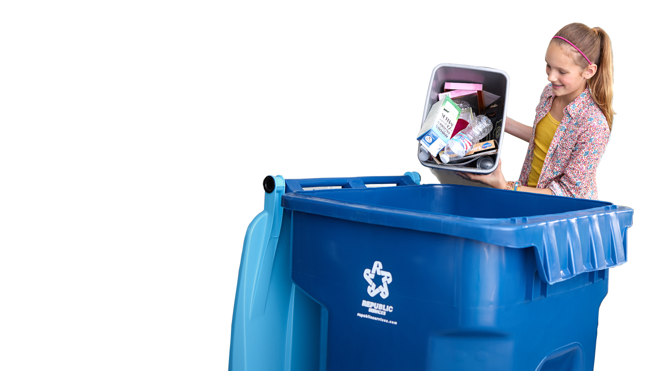 An image of a child placing unbagged recyclable items into a recycling cart