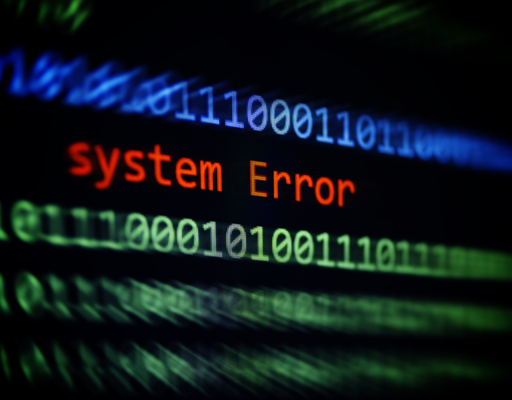 Image of a computer screen with a series of digits and letters and the words System Error